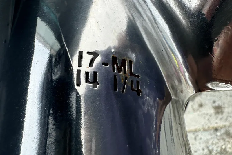  Yacht Photos Pics Engraved numbers on a shiny metal surface of a 2023 Sportsman Open 282 Center Console.