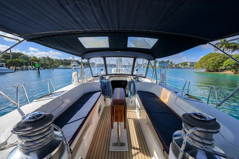 Windigo Yacht Photos Pics Cockpit view of 2003 Beneteau 50 sailboat with scenic marina backdrop.