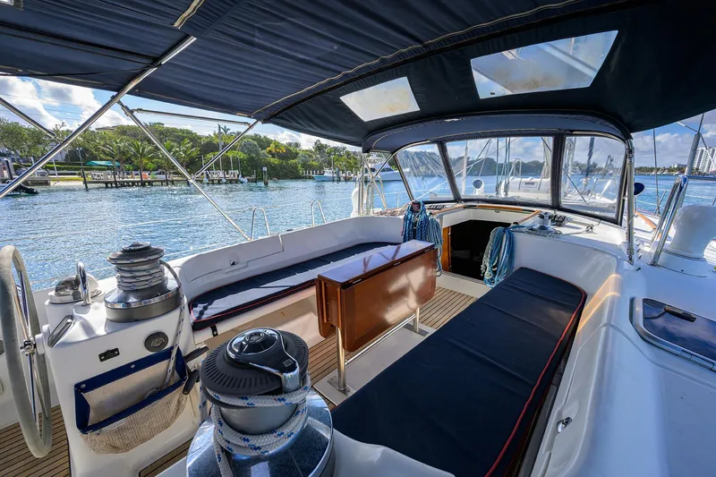 Windigo Yacht Photos Pics Cockpit view of 2003 Beneteau 50 sailboat with seating and winches, dockside.