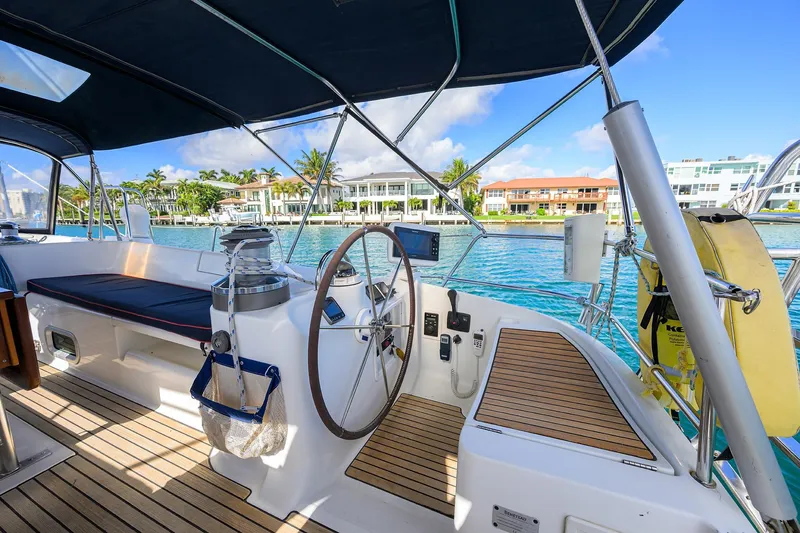 Windigo Yacht Photos Pics Cockpit of 2003 Beneteau 50 sailboat with waterfront view and modern amenities.