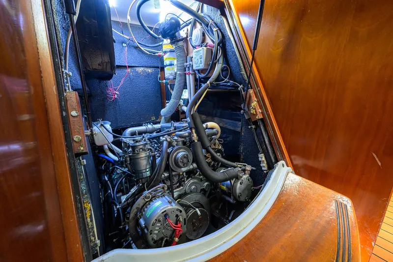 Windigo Yacht Photos Pics Engine room of a 2003 Beneteau 50 sailboat, showcasing detailed mechanical components.