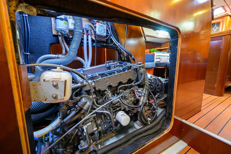 Windigo Yacht Photos Pics Engine room of a 2003 Beneteau 50 yacht, showcasing detailed mechanical components.