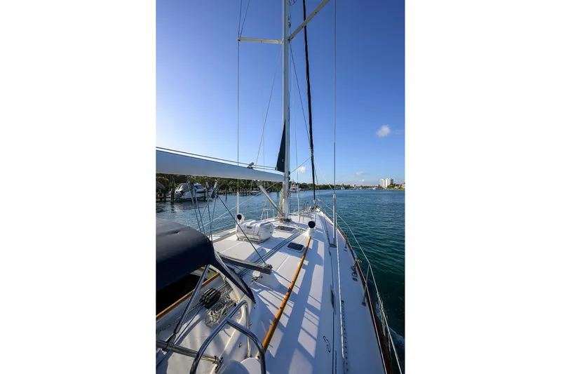 Windigo Yacht Photos Pics 2003 Beneteau 50 sailboat on calm waters under clear blue sky.