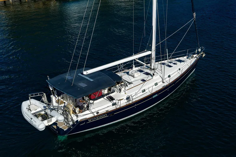 Windigo Yacht Photos Pics 2003 Beneteau 50 sailboat on calm water, featuring sleek design and spacious deck.