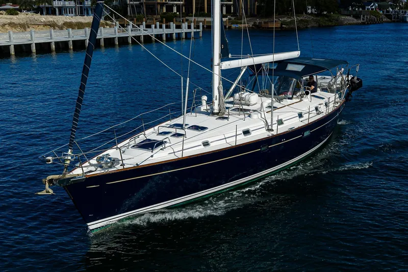 Windigo Yacht Photos Pics Sailing yacht Beneteau 50, 2003 model, cruising on calm blue waters.