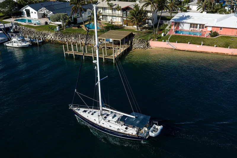 Windigo Yacht Photos Pics Aerial view of 2003 Beneteau 50 sailboat near waterfront homes.