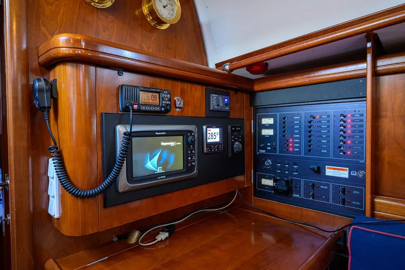 Windigo Yacht Photos Pics Navigation and control panel of a 2003 Beneteau 50 yacht, featuring advanced electronics.