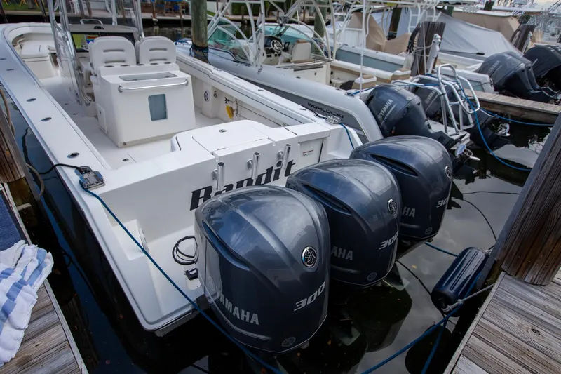 Bandit Yacht Photos Pics 2018 Jupiter 38 FS boat with four Yamaha 300 engines docked at marina.