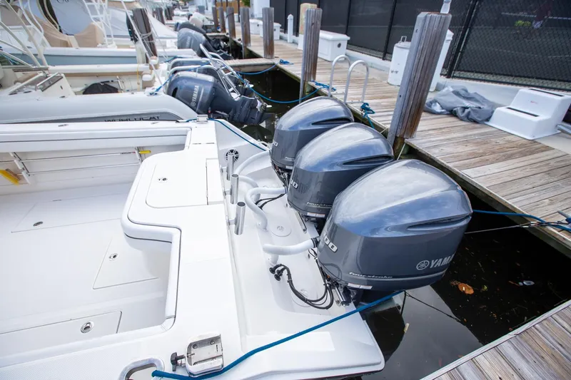 Bandit Yacht Photos Pics 2018 Jupiter 38 FS boat with Yamaha outboard engines docked at marina.