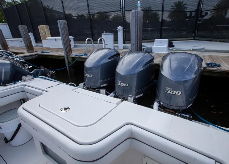 Bandit Yacht Photos Pics 2018 Jupiter 38 FS boat with triple 300 horsepower engines docked.