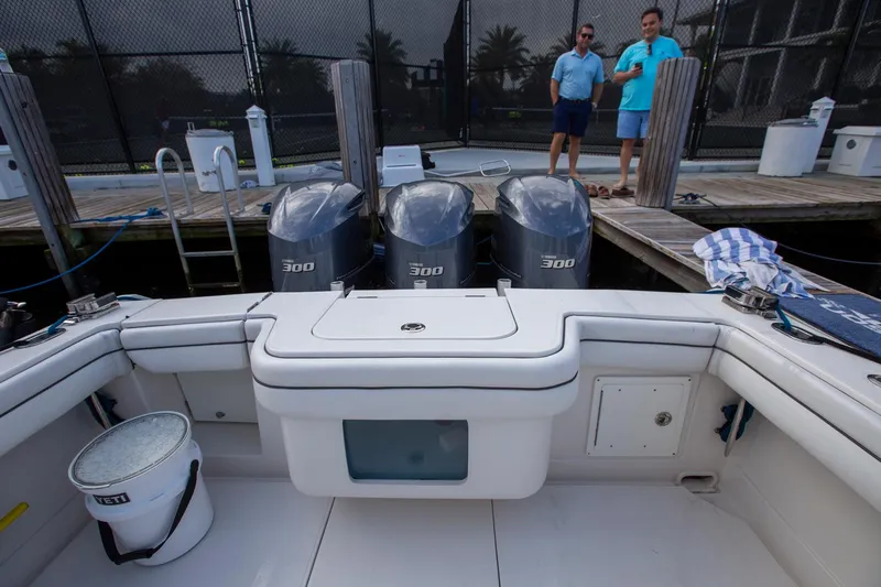 Bandit Yacht Photos Pics 2018 Jupiter 38 FS boat with triple 300 horsepower engines docked at marina.