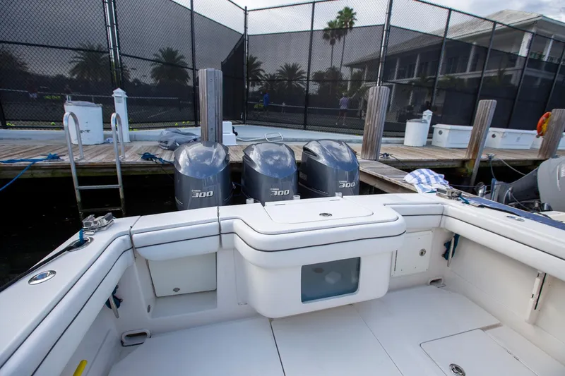 Bandit Yacht Photos Pics 2018 Jupiter 38 FS boat with triple 300 horsepower engines docked at marina.