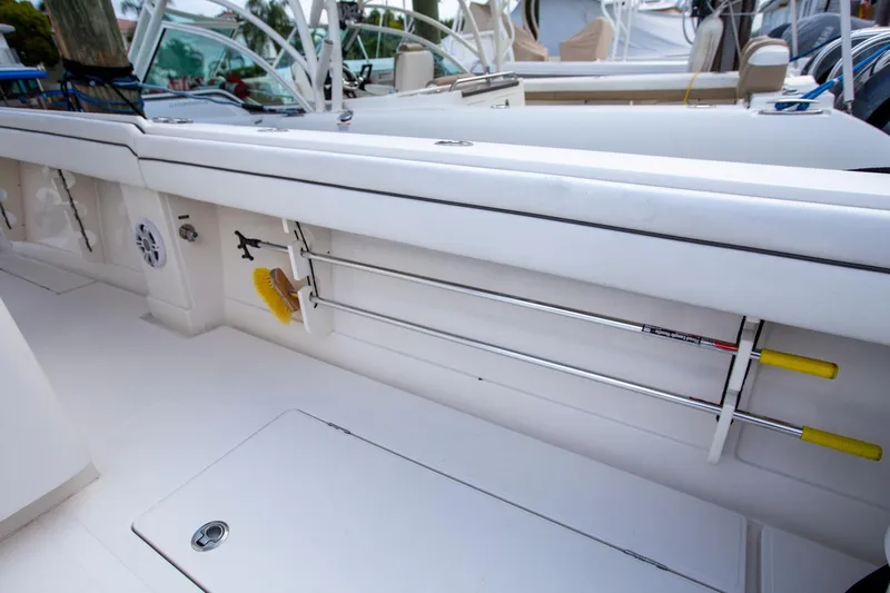 Bandit Yacht Photos Pics 2018 Jupiter 38 FS boat interior with rod holders and storage compartments.