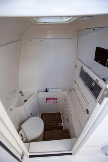 Bandit Yacht Photos Pics 2018 Jupiter 38 FS boat interior cabin with toilet and storage compartments.