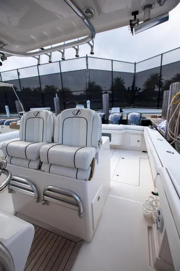Bandit Yacht Photos Pics 2018 Jupiter 38 FS boat interior with white seating and sleek design.
