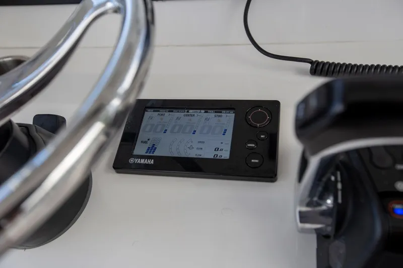 Bandit Yacht Photos Pics Close-up of a 2018 Jupiter 38 FS boat dashboard with Yamaha display.