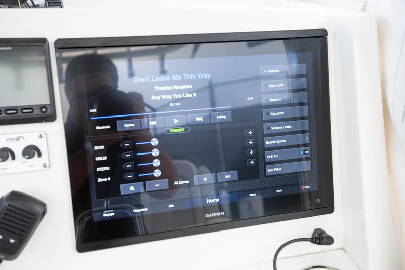 Bandit Yacht Photos Pics Garmin touchscreen display on 2018 Jupiter 38 FS boat showing music controls.