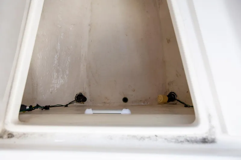 Bandit Yacht Photos Pics Storage compartment of 2018 Jupiter 38 FS boat, showcasing interior details.