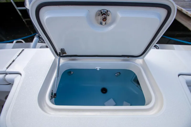 Bandit Yacht Photos Pics Open livewell on 2018 Jupiter 38 FS boat, showcasing interior water storage.