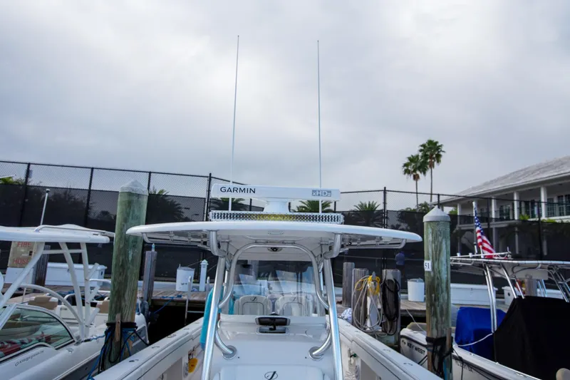 Bandit Yacht Photos Pics 2018 Jupiter 38 FS boat docked with Garmin equipment, surrounded by other boats.
