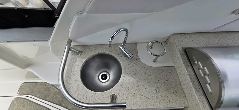  Yacht Photos Pics 2009 Sea Ray 310 Sundancer boat sink and countertop detail.