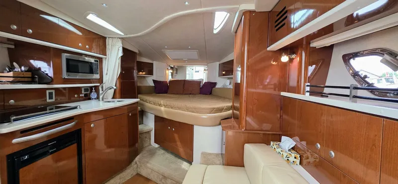  Yacht Photos Pics Luxurious interior of 2009 Sea Ray 310 Sundancer yacht with modern amenities.