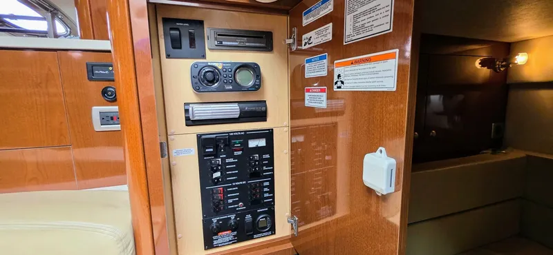  Yacht Photos Pics 2009 Sea Ray 310 Sundancer control panel with various switches and gauges.
