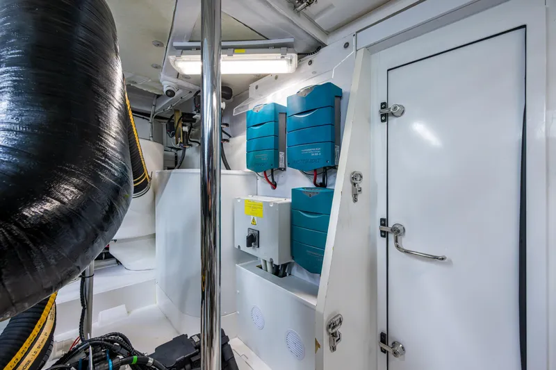 Reset Yacht Photos Pics Engine room of 2015 Fairline 78 Squadron yacht with electrical systems and equipment.