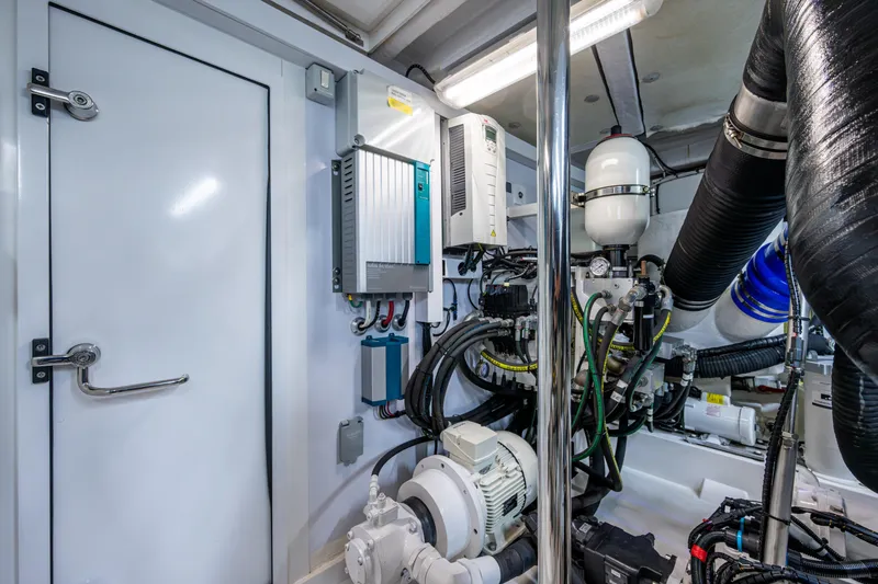 Reset Yacht Photos Pics Engine room of 2015 Fairline 78 Squadron yacht, showcasing machinery and equipment.