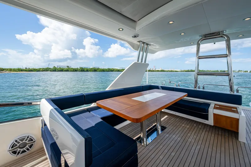 Reset Yacht Photos Pics Luxurious 2015 Fairline 78 Squadron yacht deck with seating and ocean view.
