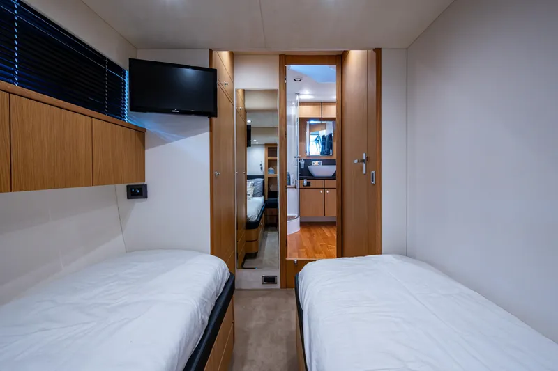 Reset Yacht Photos Pics Luxurious twin cabin interior of 2015 Fairline 78 Squadron yacht with modern amenities.