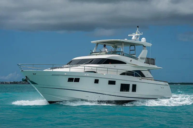 Reset Yacht Photos Pics Luxury Fairline 78 Squadron yacht cruising on turquoise waters, 2015 model.