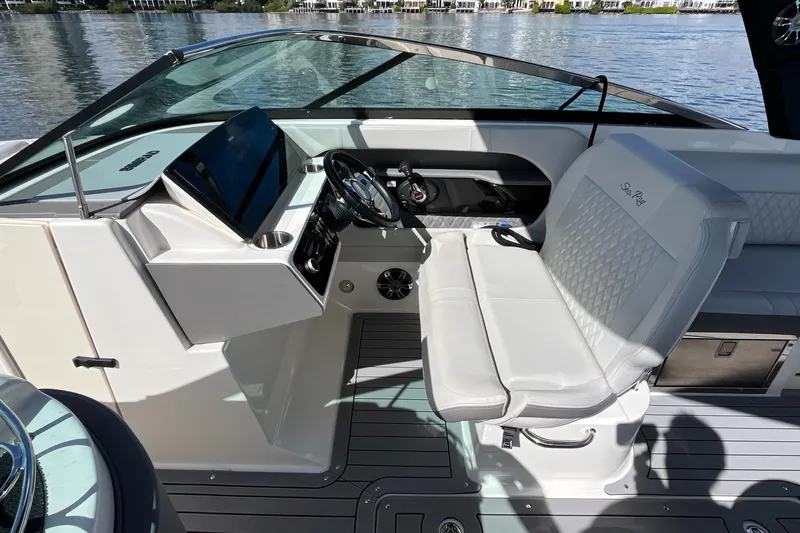 Lowest Priced 280slx In Mint Condition Yacht Photos Pics 2021 Sea Ray SLX 280 boat interior with modern helm and luxurious seating.