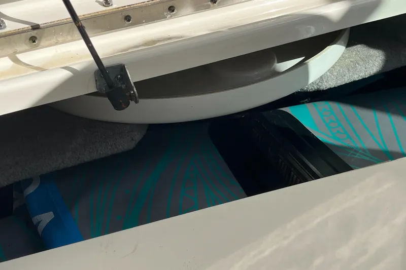Lowest Priced 280slx In Mint Condition Yacht Photos Pics Storage compartment of a 2021 Sea Ray SLX 280 boat, showing interior details.