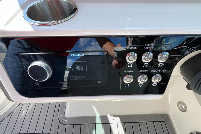 Lowest Priced 280slx In Mint Condition Yacht Photos Pics Control panel of 2021 Sea Ray SLX 280 boat with various light switches.