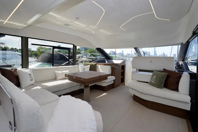  Yacht Photos Pics Luxurious interior of 2025 Prestige F5.7 yacht with elegant seating and modern design.
