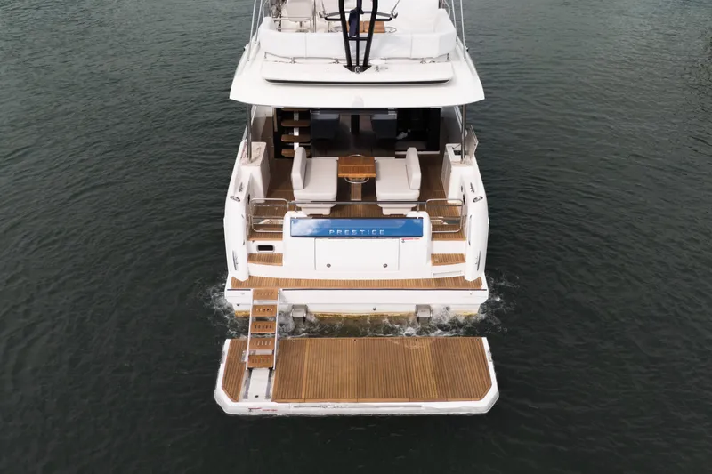  Yacht Photos Pics Luxury yacht Prestige F5.7, 2025 model, cruising on calm waters.