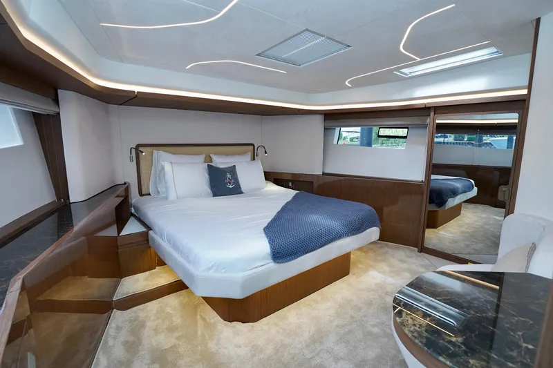  Yacht Photos Pics Luxurious bedroom interior of 2025 Prestige F5.7 yacht with modern design and elegant furnishings.