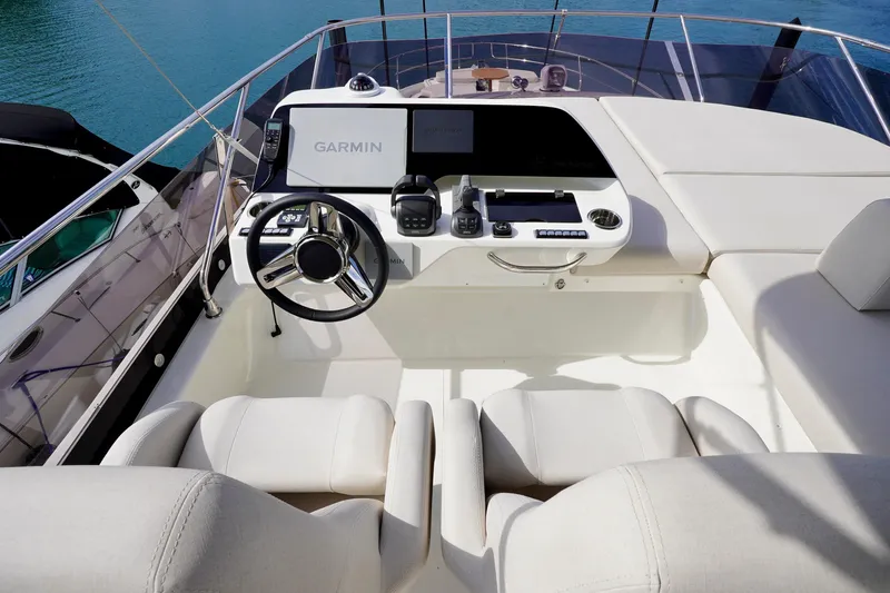  Yacht Photos Pics Luxury yacht cockpit of 2025 Prestige F5.7 with modern navigation equipment.