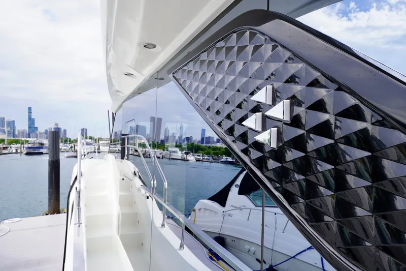  Yacht Photos Pics Luxury Prestige F5.7 yacht docked with city skyline in the background, 2025 model.