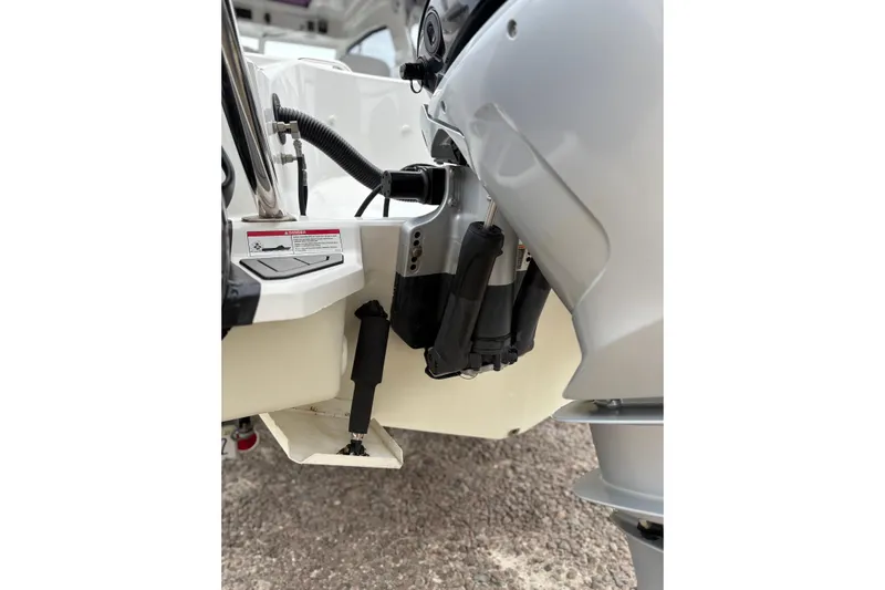 Protector Yacht Photos Pics 2020 Protector 310 Targa boat engine detail, showcasing motor and components.