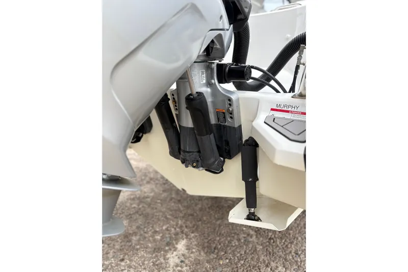 Protector Yacht Photos Pics Outboard motor of 2020 Protector 310 Targa boat, close-up view.