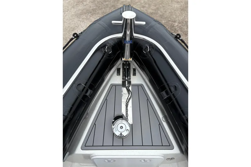 Protector Yacht Photos Pics 2020 Protector 310 Targa boat bow with sleek black and gray design.