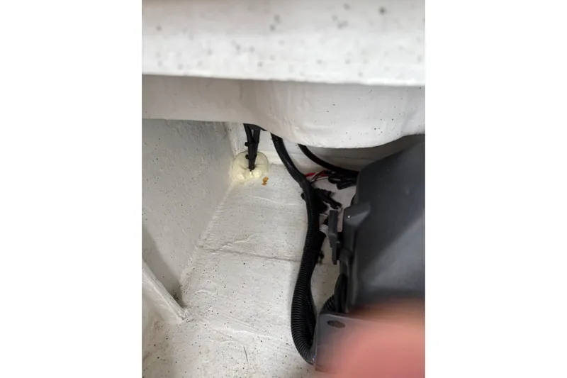 Protector Yacht Photos Pics Interior view of a 2020 Protector 310 Targa boat, showing wiring and components.