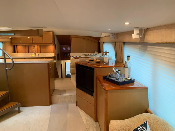  Yacht Photos Pics Luxurious interior of 2004 Ocean Yachts 57 Odyssey with modern kitchen and elegant decor.