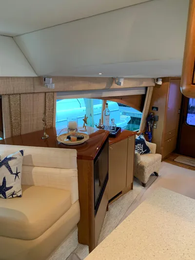  Yacht Photos Pics Luxurious interior of 2004 Ocean Yachts 57 Odyssey with elegant seating and decor.