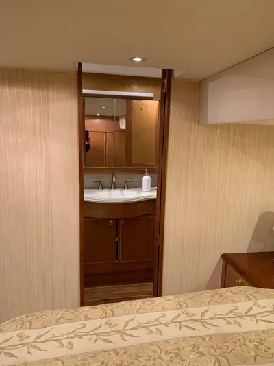  Yacht Photos Pics Luxurious interior of 2004 Ocean Yachts 57 Odyssey, featuring elegant wood finishes and modern amenities.