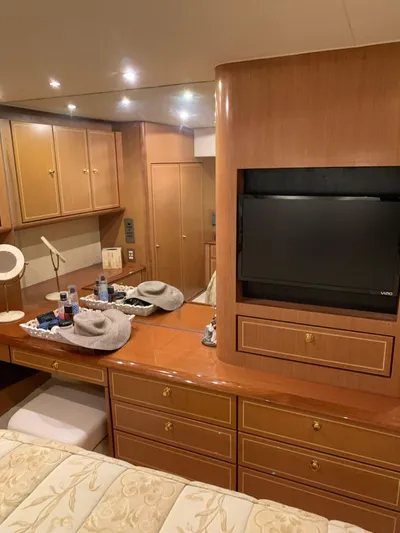  Yacht Photos Pics Luxurious interior of 2004 Ocean Yachts 57 Odyssey with wood cabinetry and modern amenities.