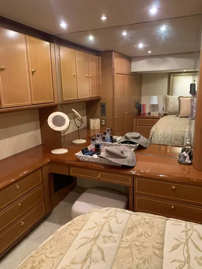  Yacht Photos Pics Luxurious cabin interior of 2004 Ocean Yachts 57 Odyssey with elegant wood cabinetry.
