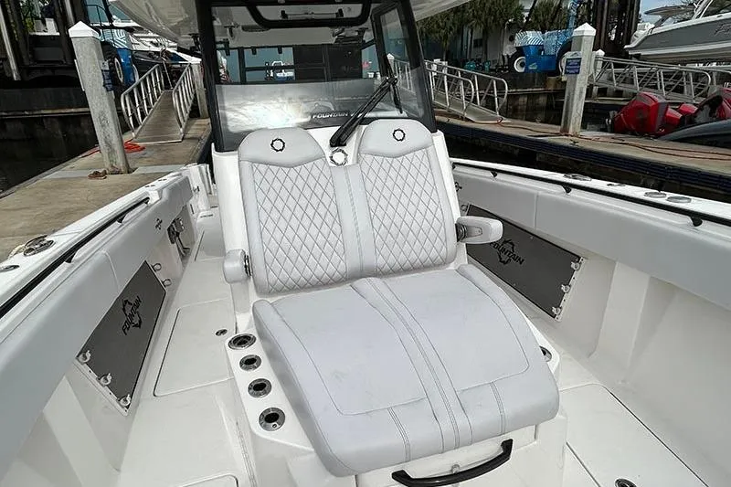  Yacht Photos Pics 2025 Fountain 38 Center Console boat interior with luxurious seating and modern design.